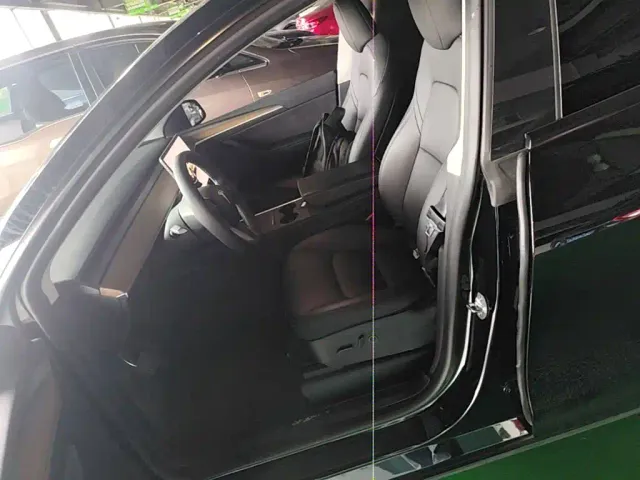 Tesla Model Y — Фото автомобиля 14