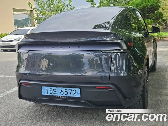 Tesla Model Y — Фото автомобиля 6
