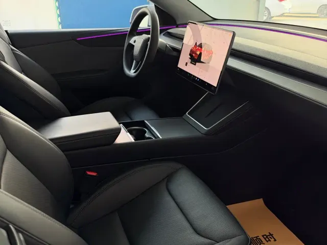 Tesla Model Y — Фото автомобиля 4