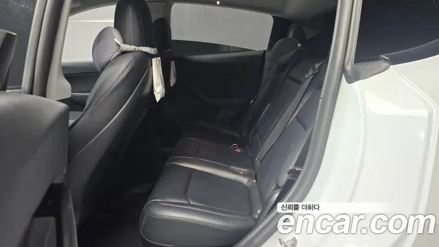 Tesla Model Y — Фото автомобиля 18