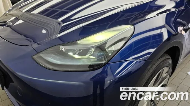 Tesla Model Y — Фото автомобиля 7