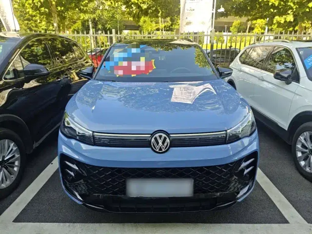 Volkswagen Tiguan L — Фото автомобиля 2