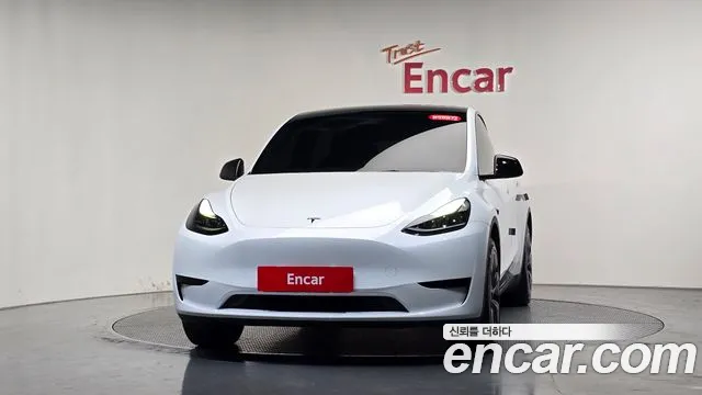 Tesla Model Y — Фото автомобиля 3