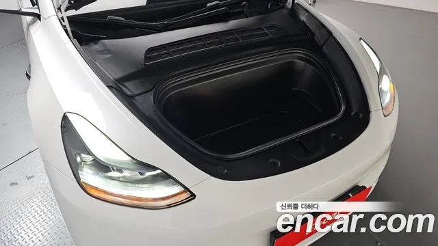 Tesla Model Y — Фото автомобиля 6