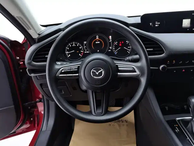 Mazda Axela — Фото автомобиля 15