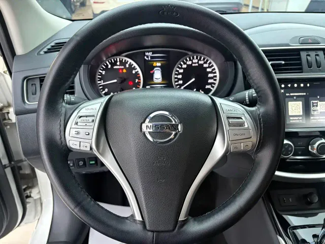Nissan Tiida — Фото автомобиля 16