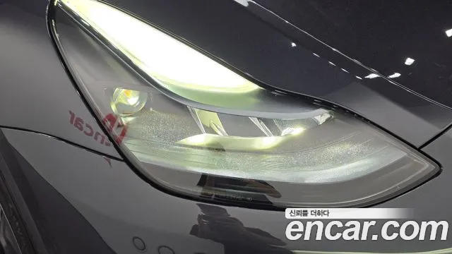Tesla Model Y — Фото автомобиля 7