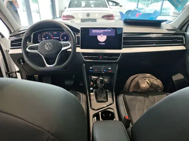 Volkswagen Tiguan L — Фото автомобиля 9