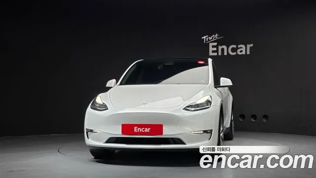 Tesla Model Y — Фото автомобиля 3