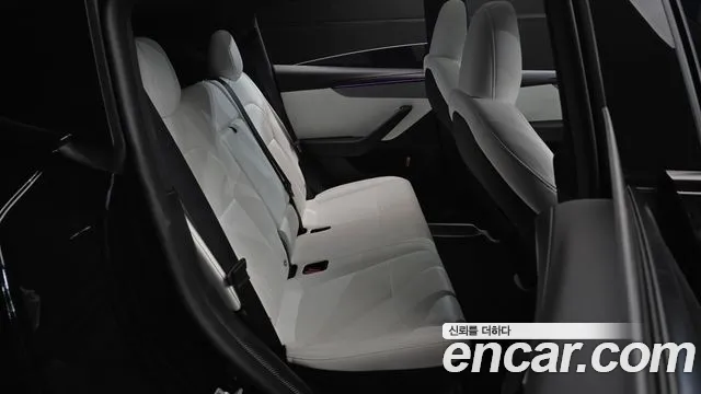 Tesla Model Y — Фото автомобиля 11