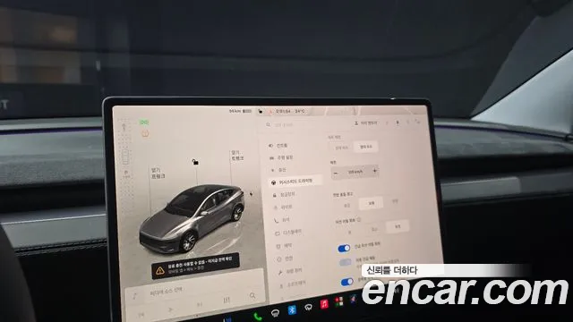 Tesla Model Y — Фото автомобиля 24