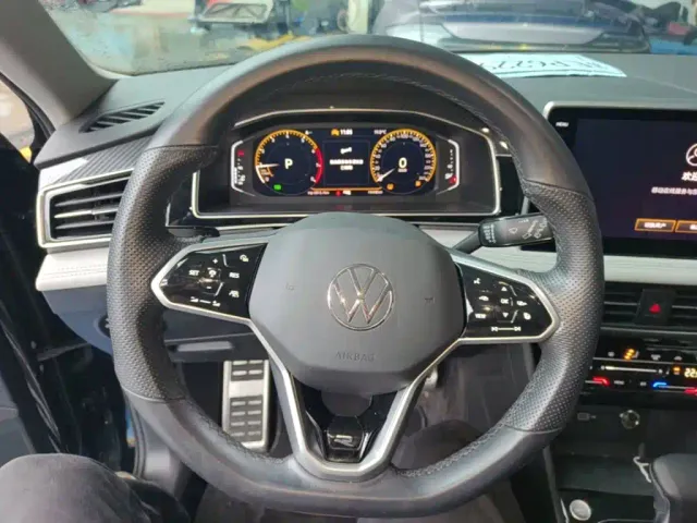 Volkswagen Tiguan L — Фото автомобиля 10