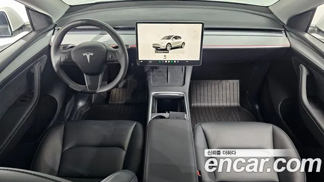 Tesla Model Y — Фото автомобиля 10