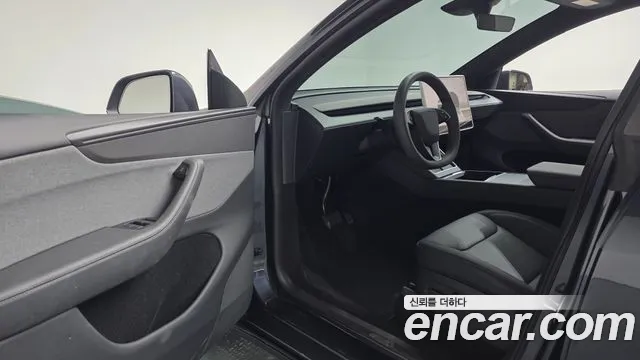 Tesla Model Y — Фото автомобиля 10