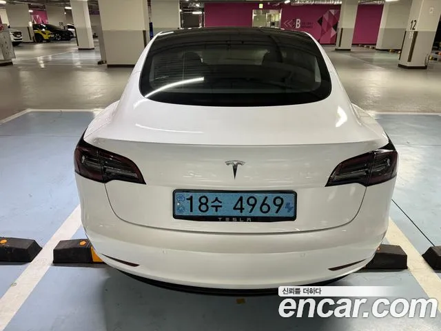 Tesla Model 3 — Фото автомобиля 7