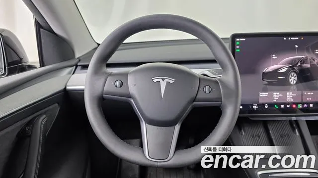 Tesla Model Y — Фото автомобиля 18