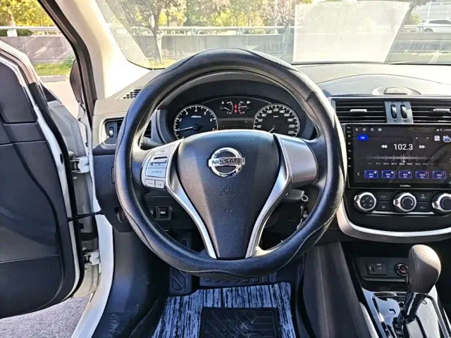Nissan Tiida — Фото автомобиля 10
