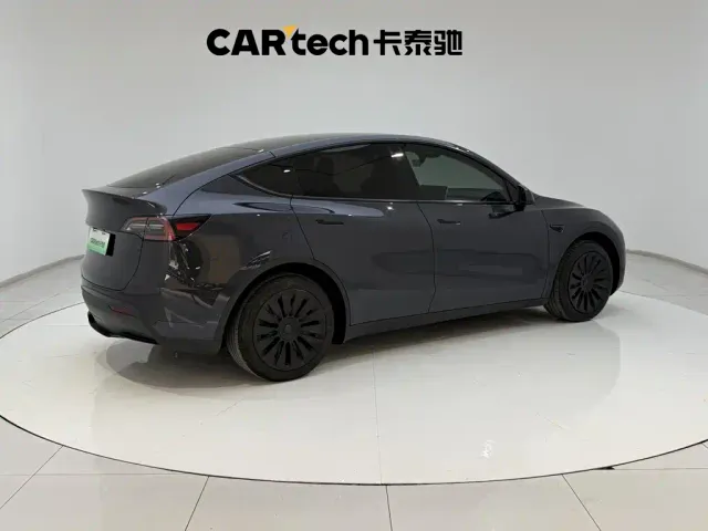 Tesla Model Y — Фото автомобиля 5