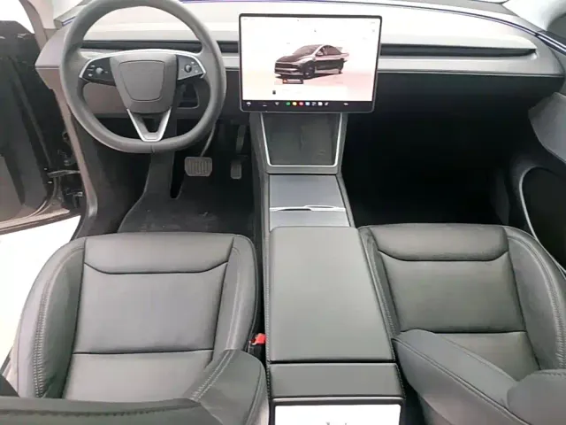 Tesla Model Y — Фото автомобиля 9