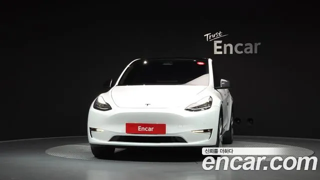 Tesla Model Y — Фото автомобиля 3