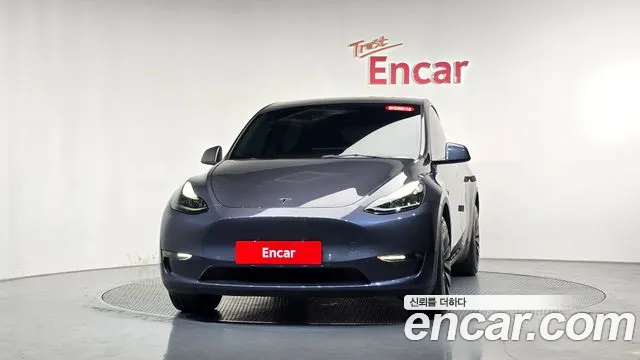 Tesla Model Y — Фото автомобиля 3