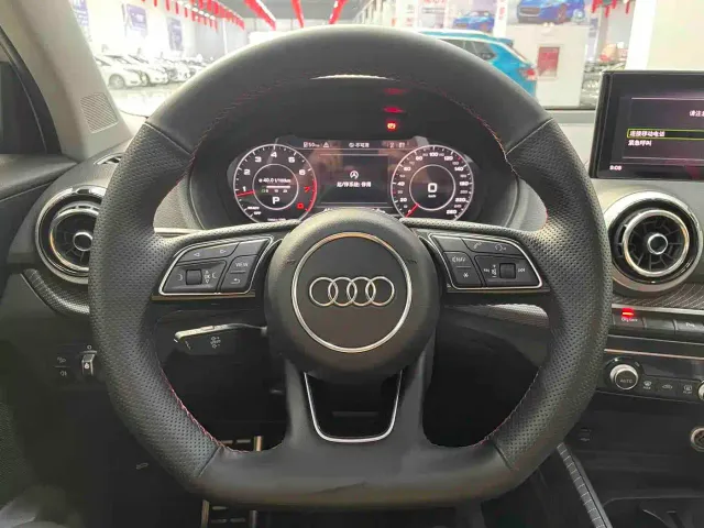 Audi Q2L — Фото автомобиля 8