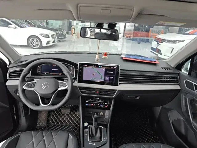Volkswagen Tiguan L — Фото автомобиля 9