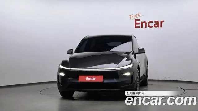 Tesla Model Y — Фото автомобиля 3