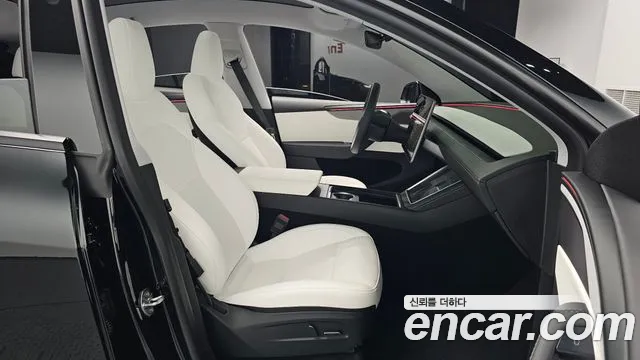 Tesla Model Y — Фото автомобиля 16