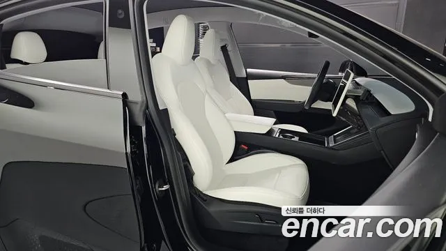 Tesla Model Y — Фото автомобиля 12
