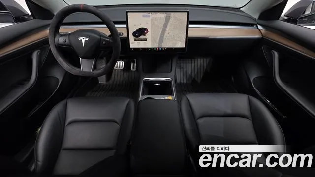 Tesla Model 3 — Фото автомобиля 10