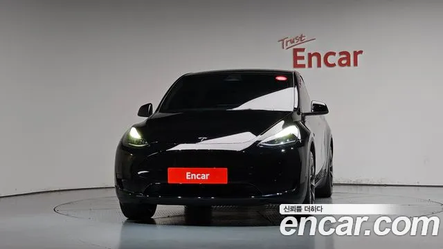 Tesla Model Y — Фото автомобиля 3