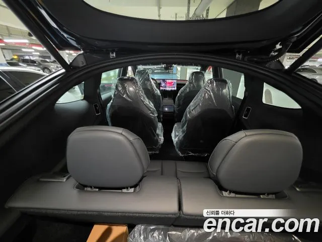 Tesla Model Y — Фото автомобиля 6