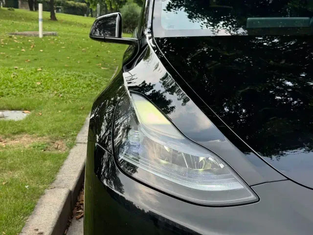 Tesla Model Y — Фото автомобиля 19