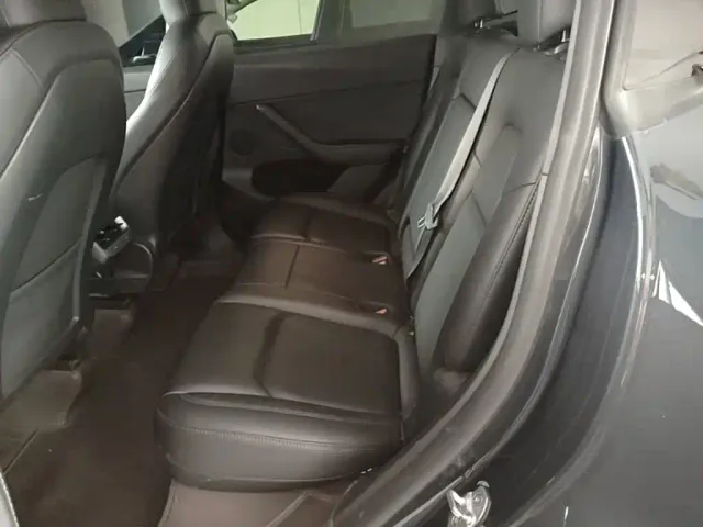 Tesla Model Y — Фото автомобиля 16