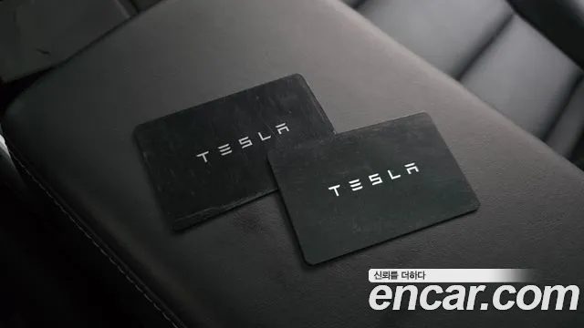 Tesla Model 3 — Фото автомобиля 25