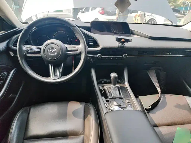 Mazda Axela — Фото автомобиля 9
