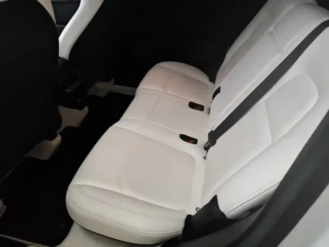 Tesla Model Y — Фото автомобиля 16