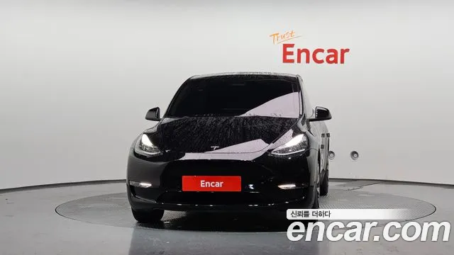 Tesla Model Y — Фото автомобиля 3
