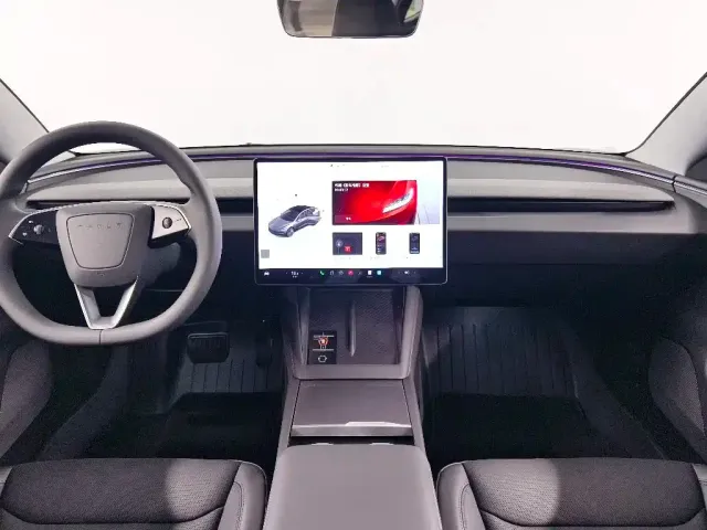 Tesla Model 3 — Фото автомобиля 8
