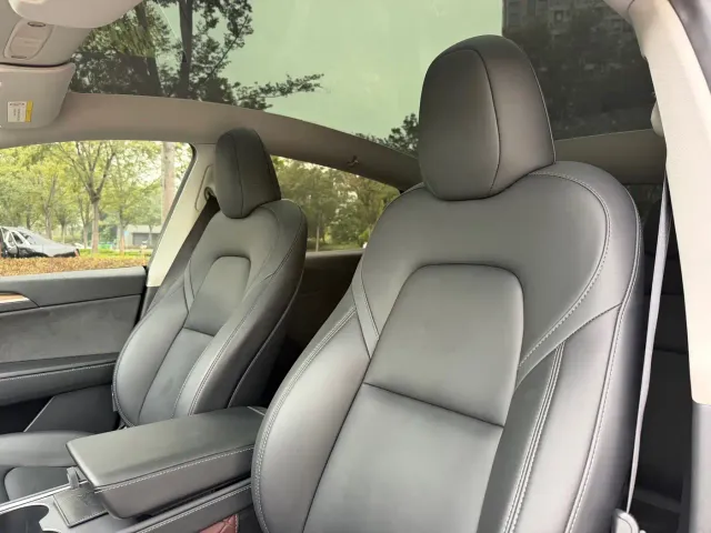 Tesla Model Y — Фото автомобиля 11