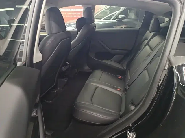 Tesla Model Y — Фото автомобиля 16