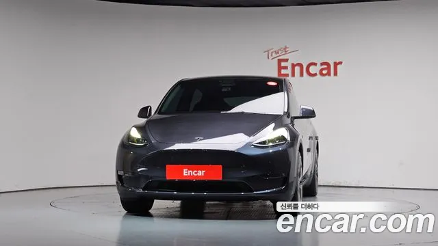 Tesla Model Y — Фото автомобиля 3