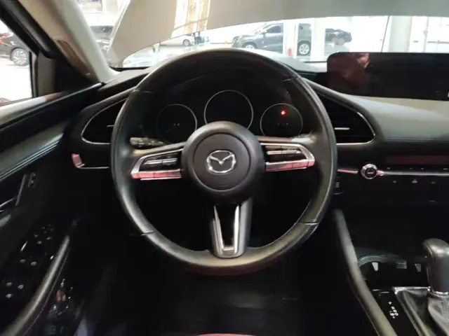 Mazda Axela — Фото автомобиля 15