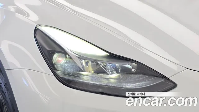 Tesla Model Y — Фото автомобиля 7