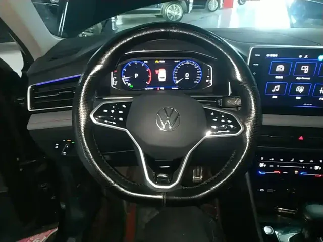 Volkswagen Tiguan L — Фото автомобиля 5