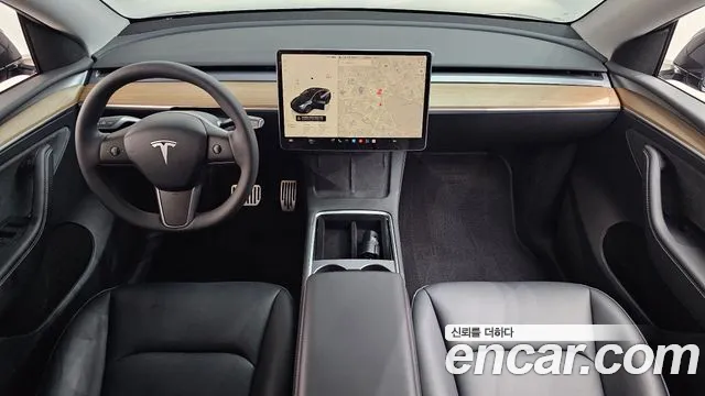 Tesla Model Y — Фото автомобиля 10