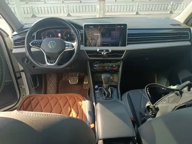 Volkswagen Tiguan L — Фото автомобиля 9