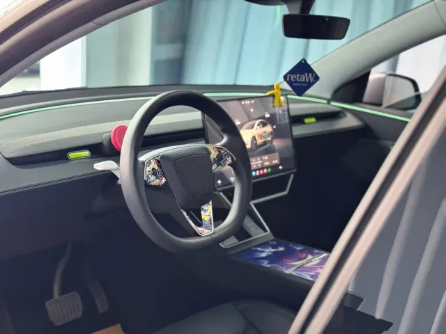 Tesla Model Y — Фото автомобиля 4