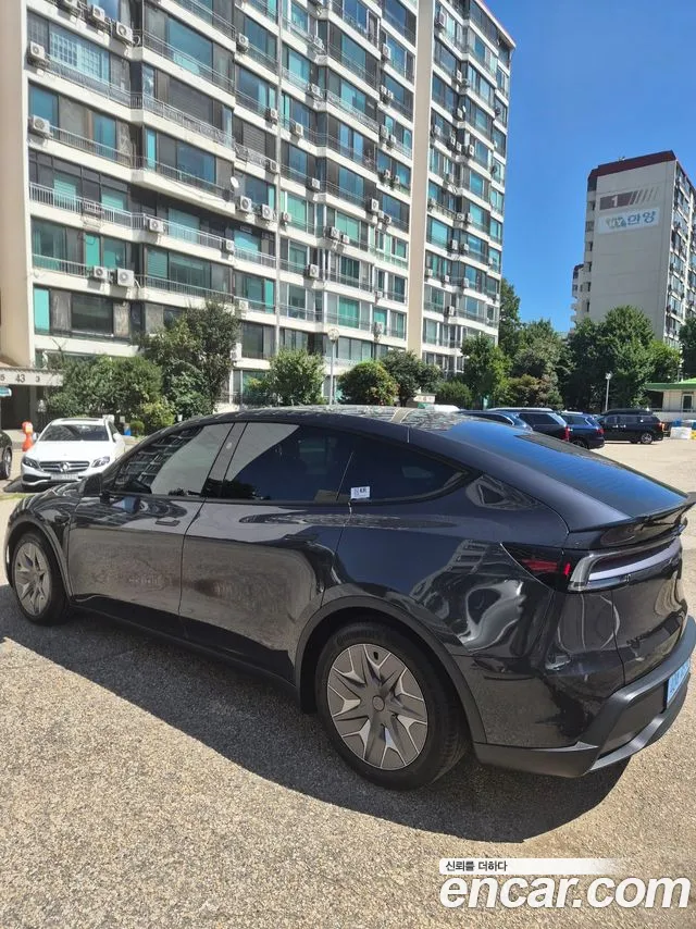 Tesla Model Y — Фото автомобиля 4